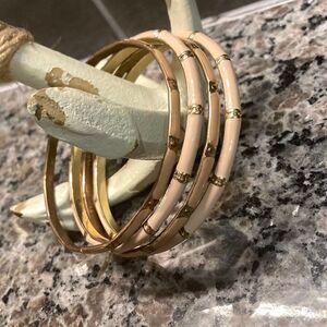 Four Piece pink,‎ blush, and gold tone enamel bracelets